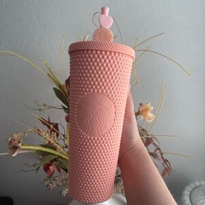 Pink studded Starbucks cup